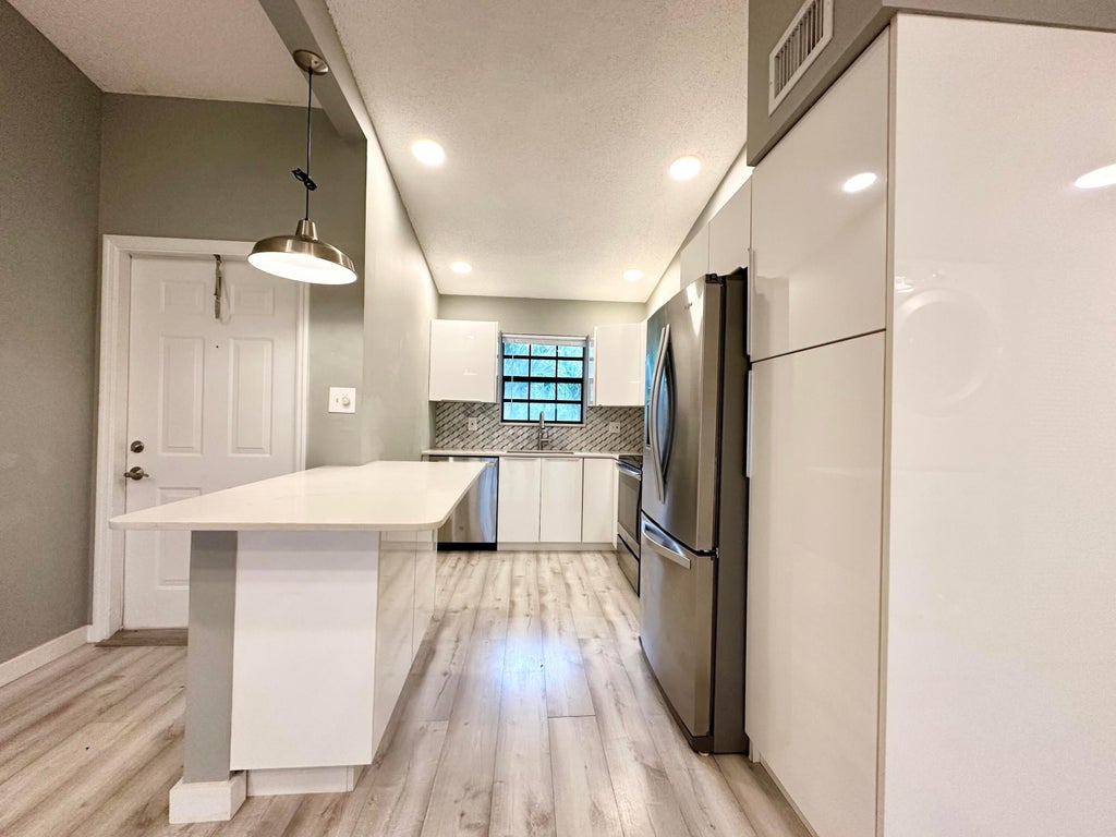 Photo of 2800 Palmwood Terrace #2210, Boca Raton, FL 33431 (MLS # B26036399)