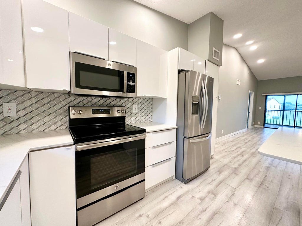 Photo of 2800 Palmwood Terrace #2210, Boca Raton, FL 33431 (MLS # B26036399)