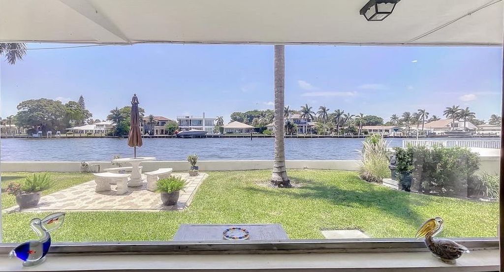 Photo of 701 S Riverside Drive #103, Pompano Beach, FL 33062 (MLS # F10377478)