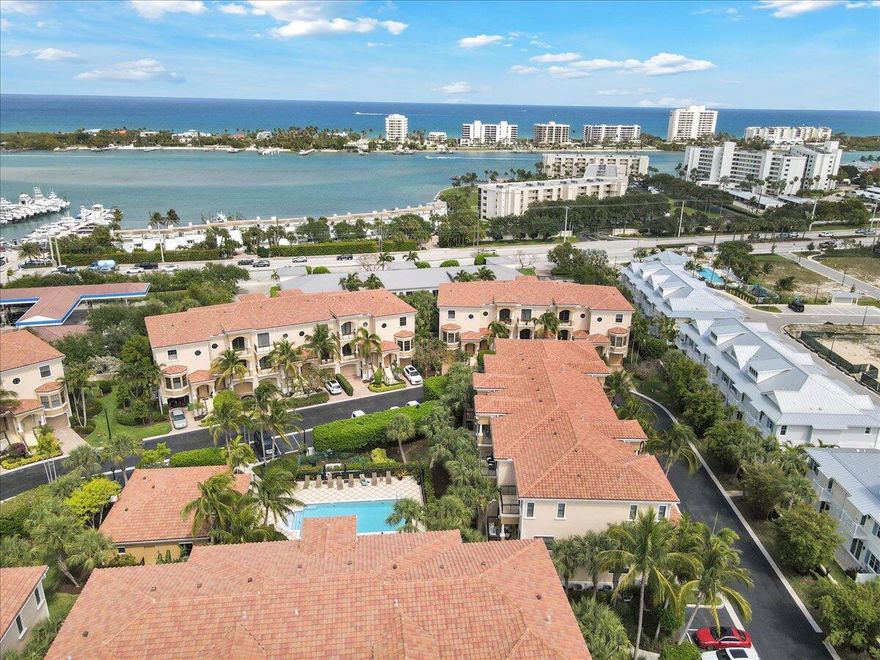 Rare opportunity in one of the area's most unique communities! 3 story split level CBS townhouse with its own private elevator, garage, pool view, impact glass and smart home system, Starlink, and pre-wired for a generator. 3 bedrooms, 3 full baths, half bath, 2 wet bars, dining and breakfast area, 11' ceilings, ground level patio and 3 balconies.   Kitchen features stainless appliances and gas stove, Barnwood wall and bar add additional rustic charm. Tesla charger installed and included in sale.  Exceptional location on US1 by the intracoastal and all of Tequesta's best shopping and dining. Convenient to Jupiter and Juno's beaches, a short drive to Abacoa, Stuart, West Palm, and an easy ride to 95 and the Turnpike. HOA fee includes roof maintenance, exterior building insurance, cable, common areas, pool and lawn service, and security gate.