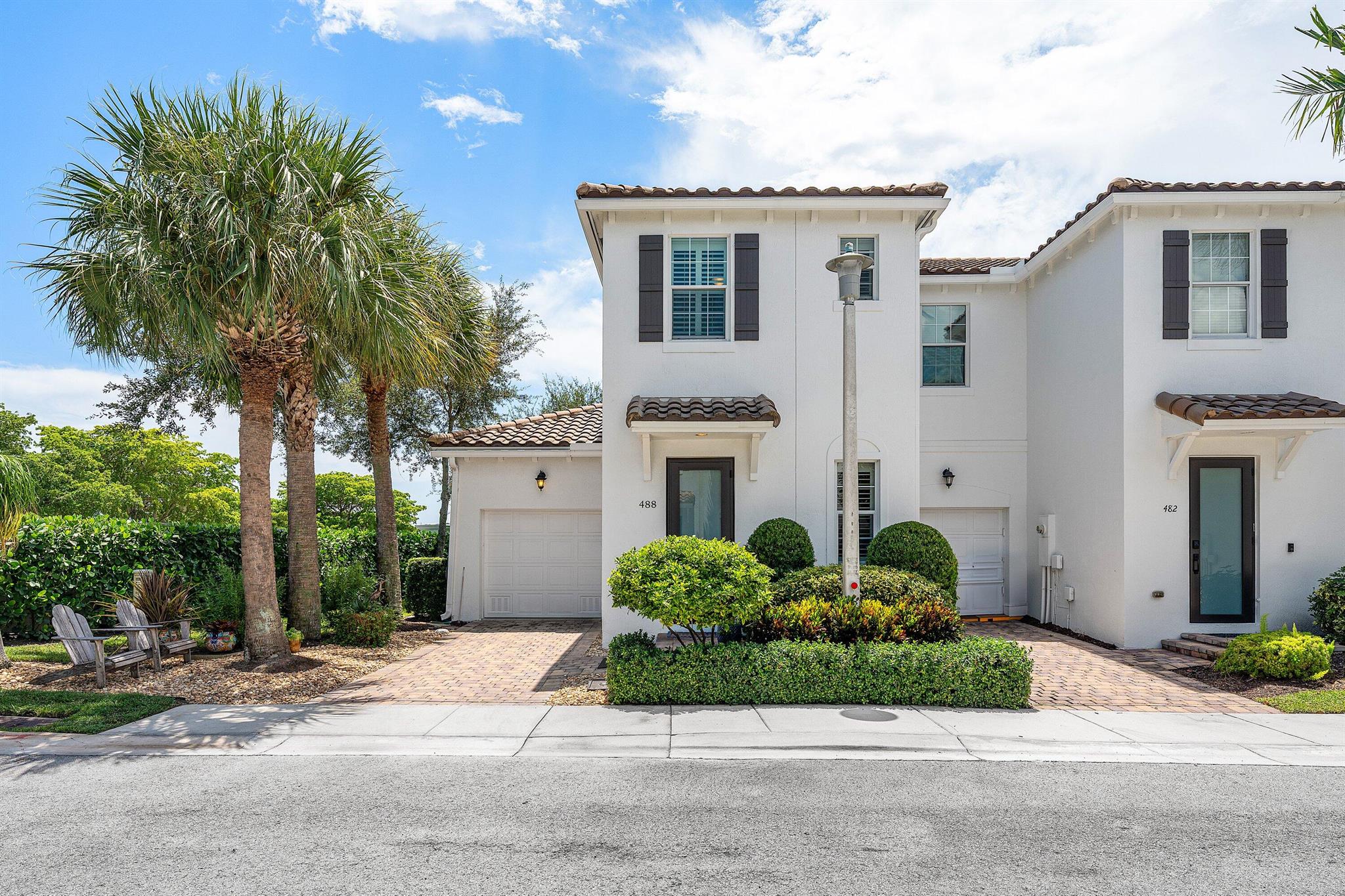 Ideally located on the Delray/Boynton line just minutes from the beach & Atlantic Ave, this upgraded home is move-in ready! Enjoy impact windows, soaring ceilings, beautiful floors, & a spacious open kitchen with new appliances and rich cabinetry. Featuring two master suites (one with Roman tub), interior laundry, a roomy garage, and an extended paver patio & driveway for outdoor living. Tons of recent upgrades include a new AC, water heater, appliances, front door, and a remodeled bath. All this in a charming LOW HOA community with pool & playground, just moments from Atlantic Ave's dining, shopping, and nightlife plus pristine beaches, golf, and waterfront fun!