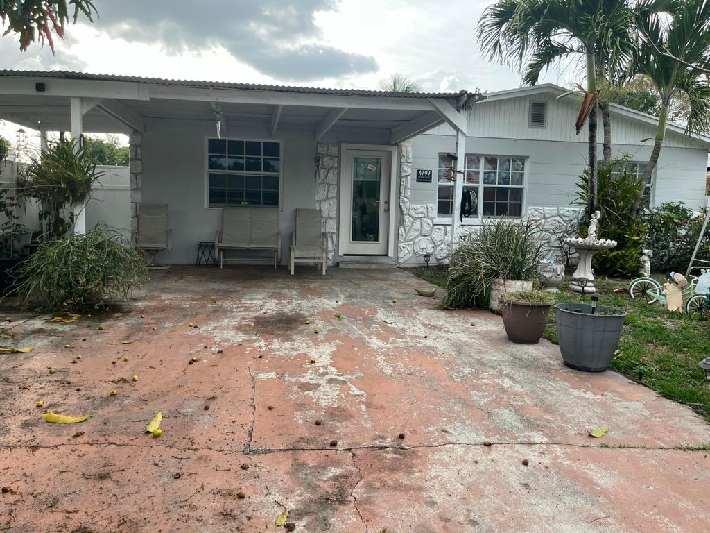 Photo of 4799 Lehto Lane, Lake Worth, FL 33461 (MLS # B26015576)