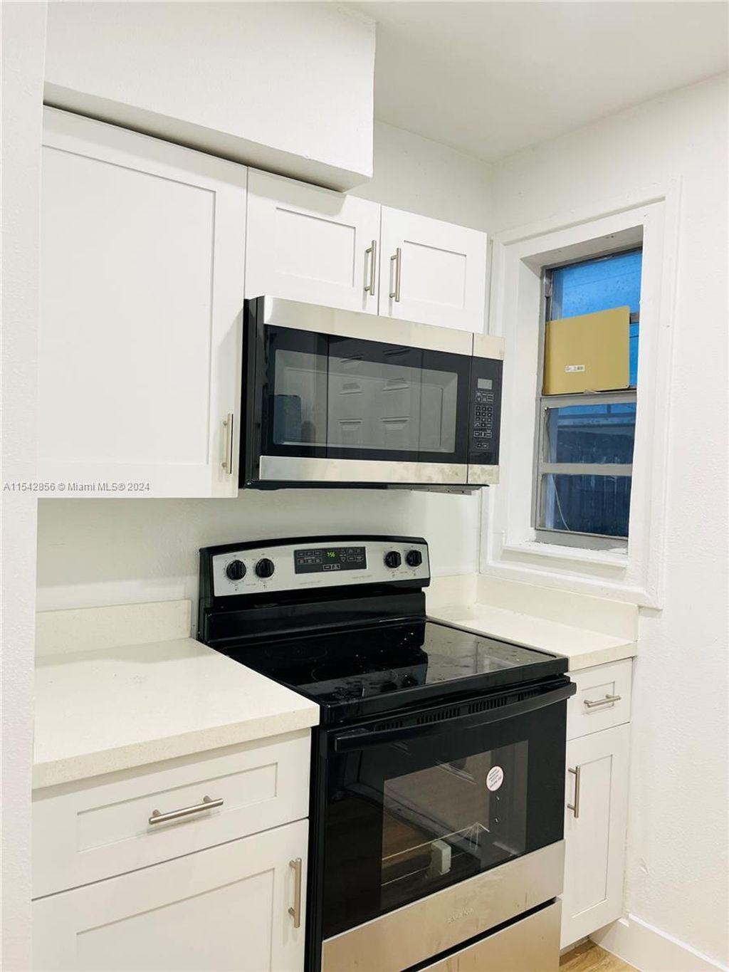 Photo of 800 W 3rd Street, Riviera Beach, FL 33404 (MLS # R11069385)