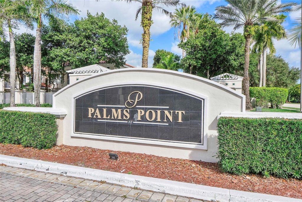 Photo of 11655 W Atlantic Blvd #2, Coral Springs, FL 33071 (MLS # F10541286)
