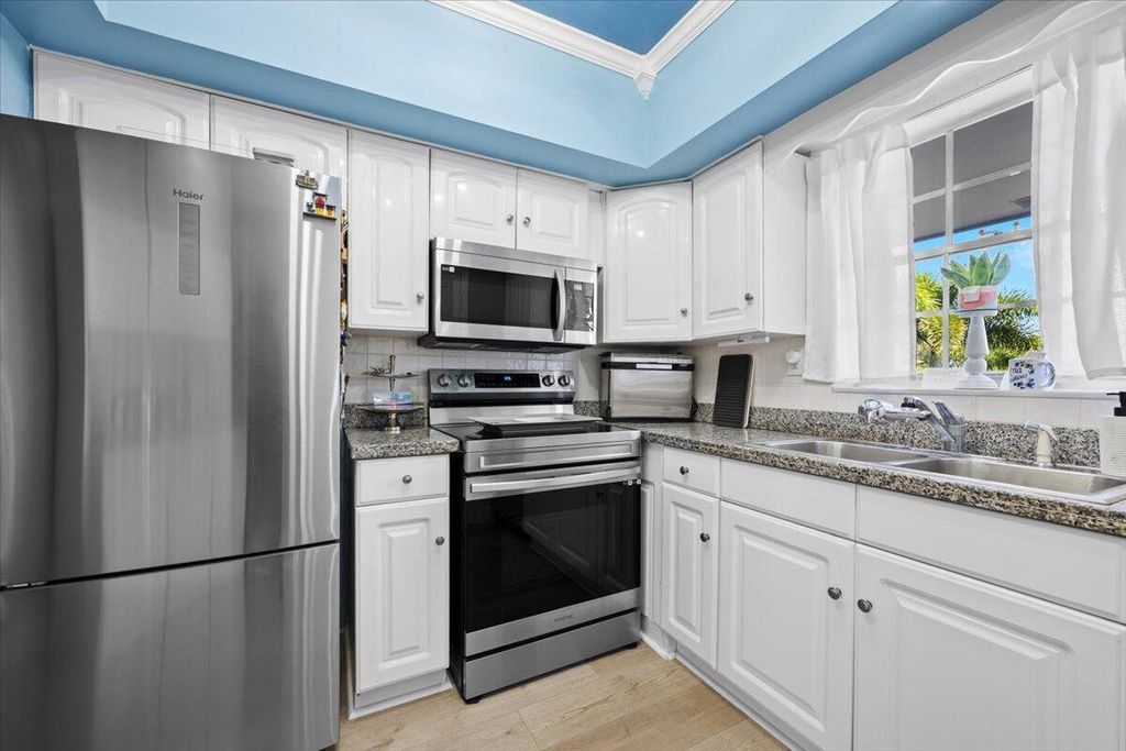 Photo of 169 Atlantis Boulevard #304, Lake Worth, FL 33462 (MLS # R11118886)