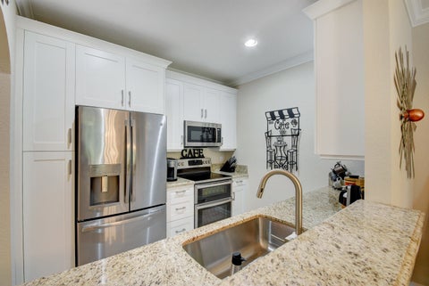 Photo of 5767 Monterra Club Drive, Lake Worth, FL 33463 (MLS # B26090600)
