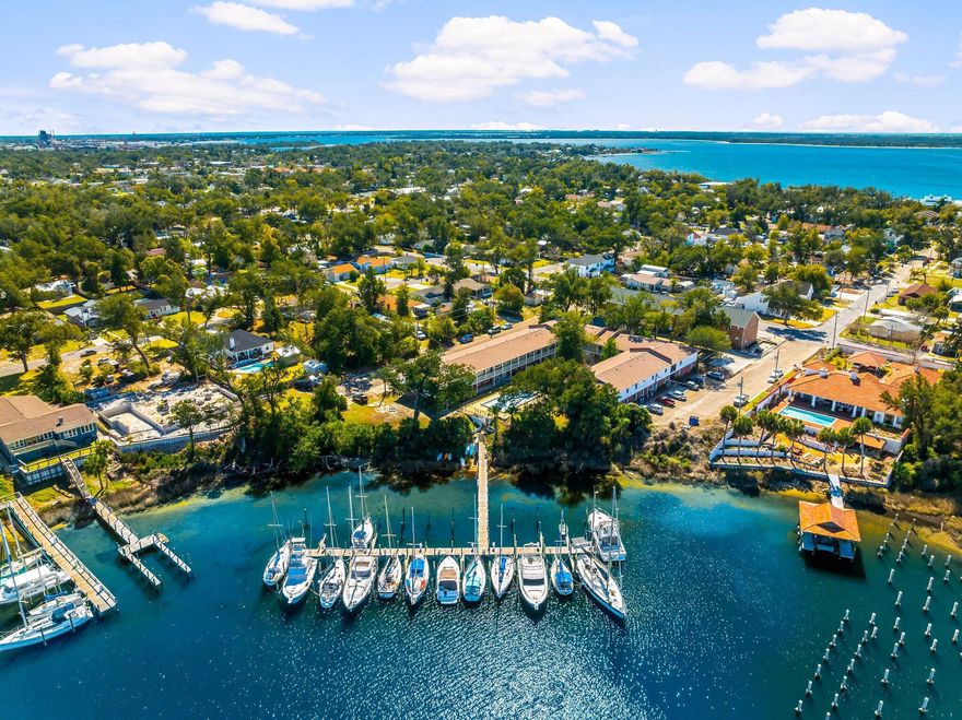 This exceptional 34-unit waterfront community, complete with a 22-slip marina, is now offered at a newly adjusted price, creating an even stronger value proposition for investors. In addition to its comprehensive renovations and prime waterfront amenities, the property includes an income-generating on-site laundry facility and a low-maintenance marina that produces steady revenue, further strengthening the asset's operational performance. With 22 units fully renovated down to the studs in 2020, upgraded mechanicals, new roofs, contemporary interiors, and a history of consistently high occupancy, this community offers both stability and long-term growth potential.