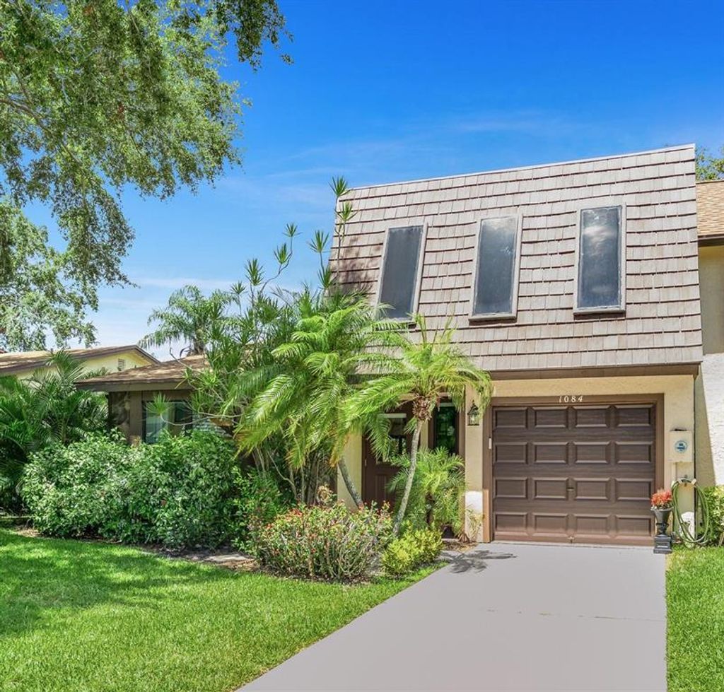 Photo of 1084 Raintree Drive, Palm Beach Gardens, FL 33410 (MLS # R10731618)