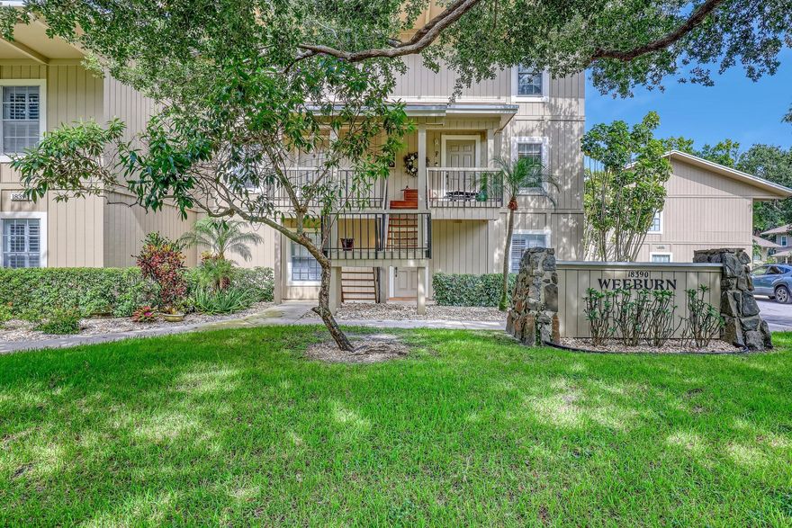 Located in charming Tequesta. Riverbend Country Club is a gated, all ages welcome community. This well cared for home offers an updated kitchen with newer appliances and engineered hardwood flooring throughout that is open to a light and bright living and dining area, the main balcony overlooks a natural serene setting. There is a beautiful newly updated powder room on the main floor. Upstairs you will find a spacious updated master suite, with private balcony, and a second bedroom and updated bath, with nobody living above you! New roof 2024! Be sure not to miss this special property.    This well cared for home offers an updated kitchen with newer appliances and engineered hardwood flooring throughout that is open to a light and bright living and dining area, the main balcony overlooks a natural serene setting. There is a beautiful newly updated powder room on the main floor. Upstairs you will find a spacious updated master suite, with private balcony, and a second bedroom and updated bath, with nobody living above you! New roof 2024! Be sure not to miss this special property.   Quarterly golf dues of $715 include a private 18-hole Fazio golf course, tennis, pickle ball, swimming, water activities, clubhouse and more! Riverbend is located between the beautiful banks of the Loxahatchee River, and Jonathan Dickinson State Park. Riverbend offers resort style living at its finest. The pool and clubhouse sit along the quiet and scenic Loxahatchee River. Be in Jupiter or the heart of Tequesta in minutes to experience 5-star dining, aqua blue beaches, and fabulous shopping. Airport and highways are close by as well!