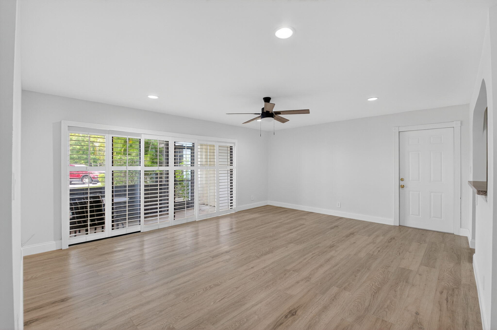 Motivated Seller! Seller Will Pay First Year of Buyer's HOA Dues!Welcome to this fabulous updated 2-bedroom, 2-bathroom first-floor condo in a quiet, all-ages community just minutes from the beach, shopping, dining, and entertainment. This move-in ready home features brand new paint, stylish vanities, and durable waterproof vinyl flooring throughout. A new roof was installed in 2024, offering long-term value and peace of mind. Additional upgrades include plantation shutters, impact windows, updated lighting and ceiling fans, and a new 2024 A/C unit and dishwasher Enjoy your morning coffee or unwind in the evening on your private screened-in patio, offering a peaceful outdoor space with added privacy.