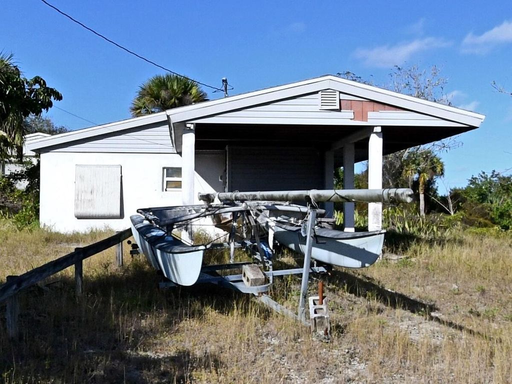 Photo of 210 River Palm Drive, Fort Pierce, FL 34946 (MLS # R11103354)