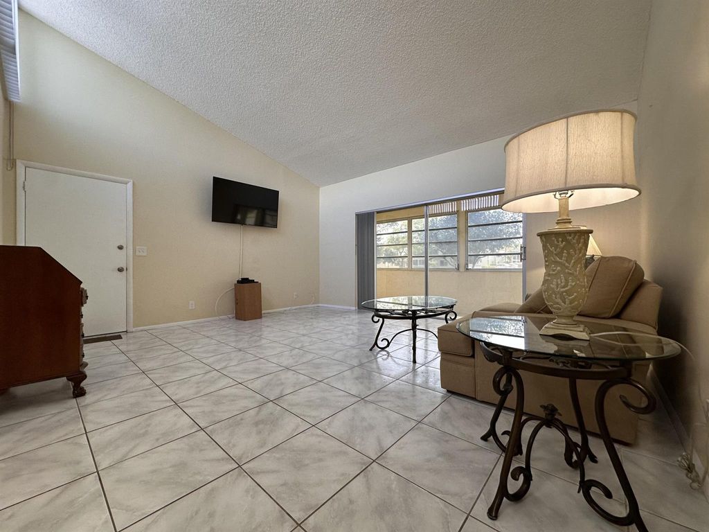 Photo of 2601 Boundbrook Boulevard #111, Palm Springs, FL 33406 (MLS # R10968775)