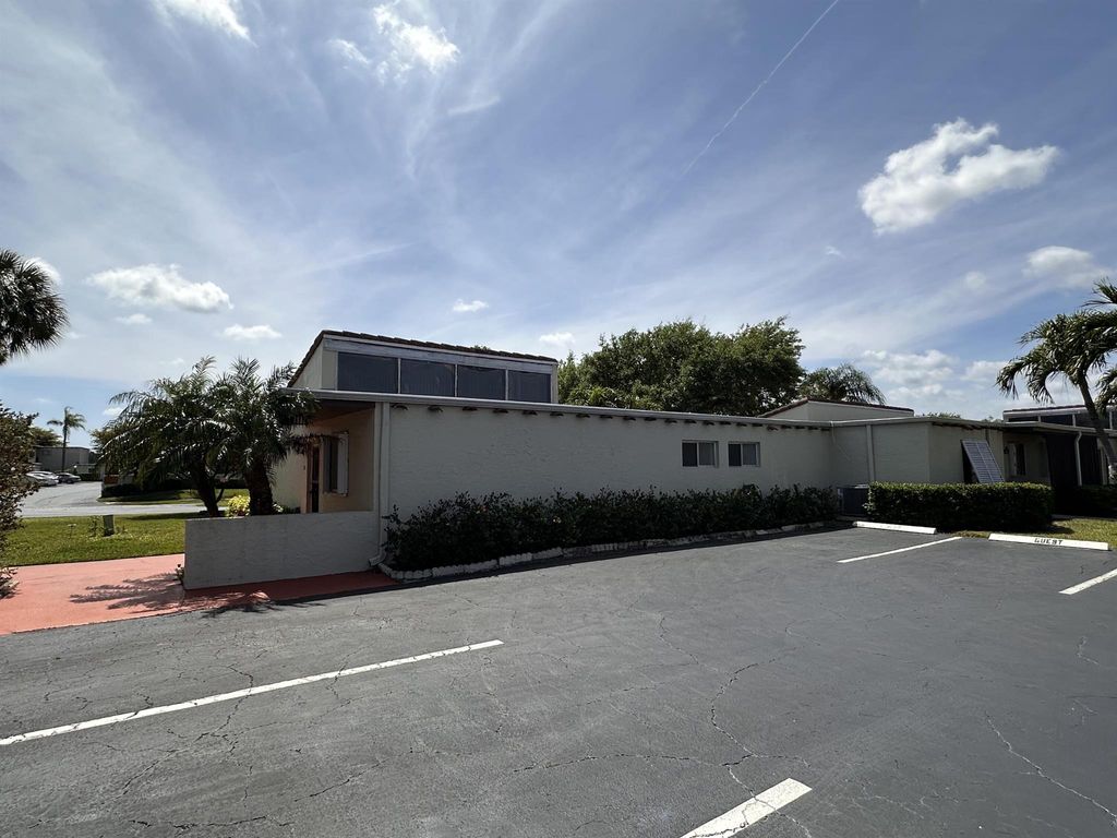 Photo of 2601 Boundbrook Boulevard #111, Palm Springs, FL 33406 (MLS # R10968775)