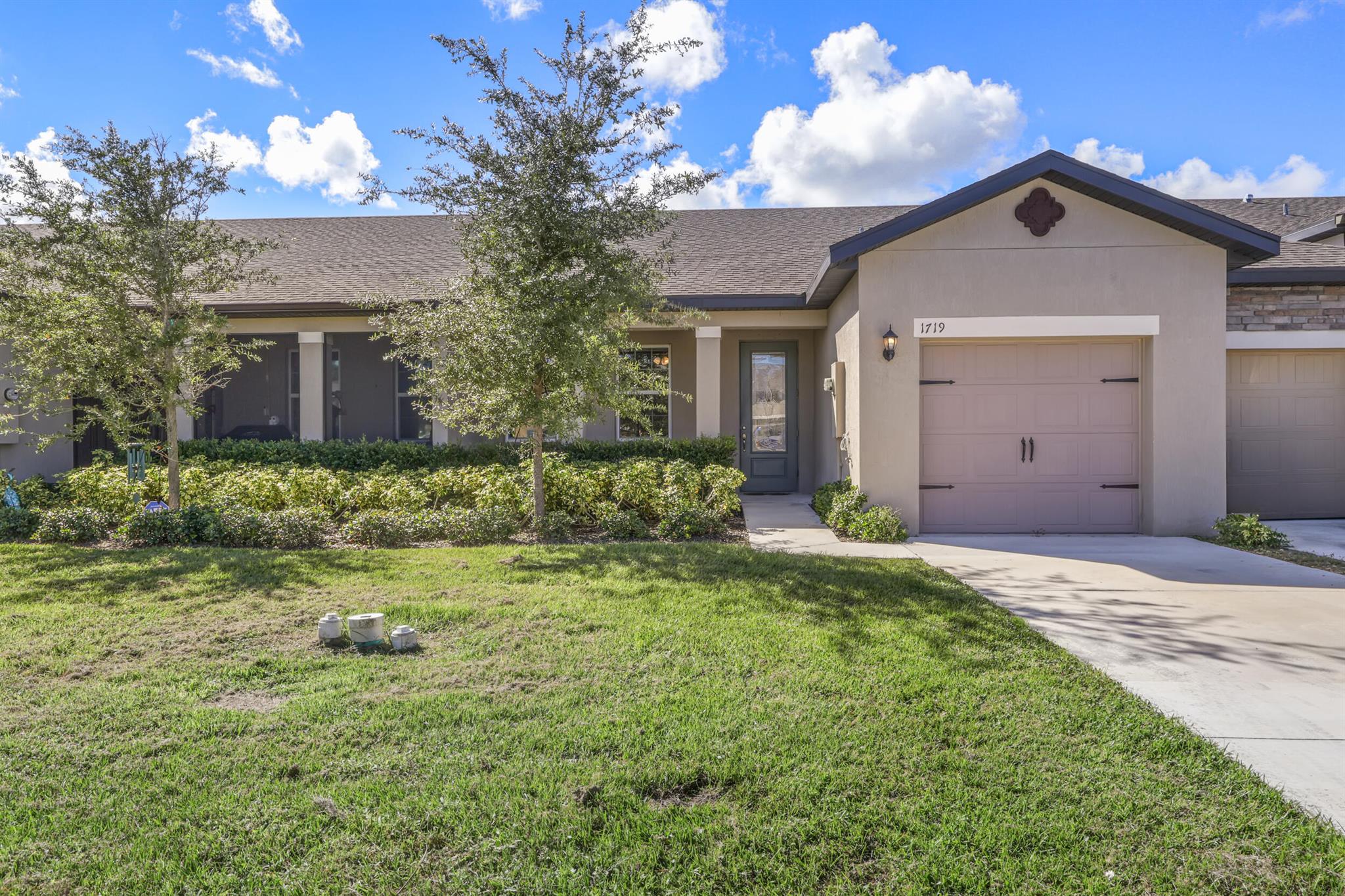 This charming villa features a welcoming covered front porch and an open-concept kitchen complete with a large island, quartz countertops, stainless steel appliances, and two pantry closets. The home includes a washer and dryer for your convenience, and lawn maintenance is provided. Located on a scenic pond, residents will enjoy access to Celebration Pointe's many amenities -- including a resort-style swimming pool, picnic pavilion, children's playground, and fenced dog park.