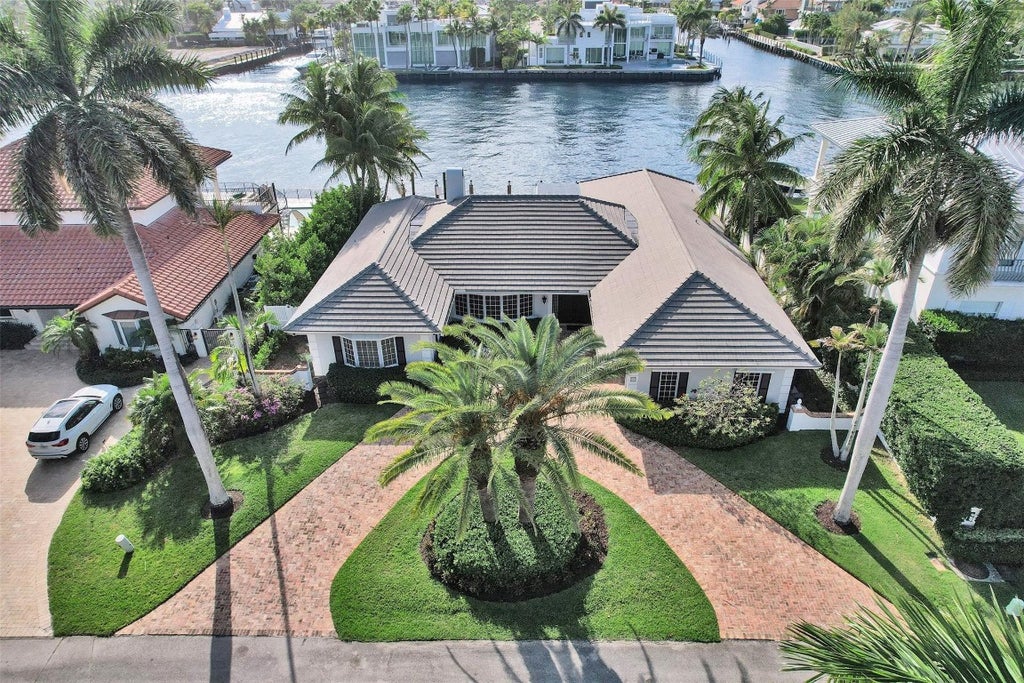 Photo of 7 Saranac Road, Sea Ranch Lakes, FL 33308 (MLS # F10543534)