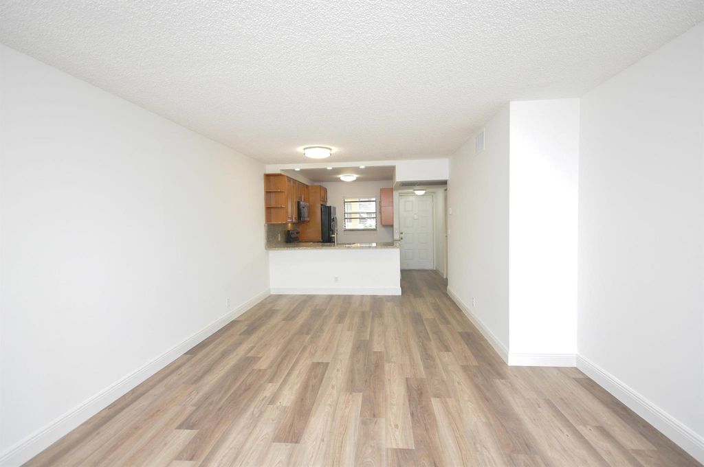 Photo of 7101 Golf Colony Court #103, Lake Worth, FL 33467 (MLS # R11117143)