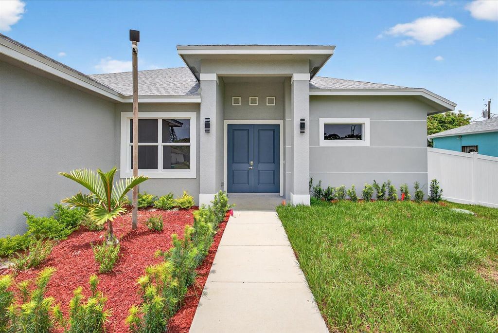 Photo of 714 SW Broadview Street, Port Saint Lucie, FL 34983 (MLS # R11106801)
