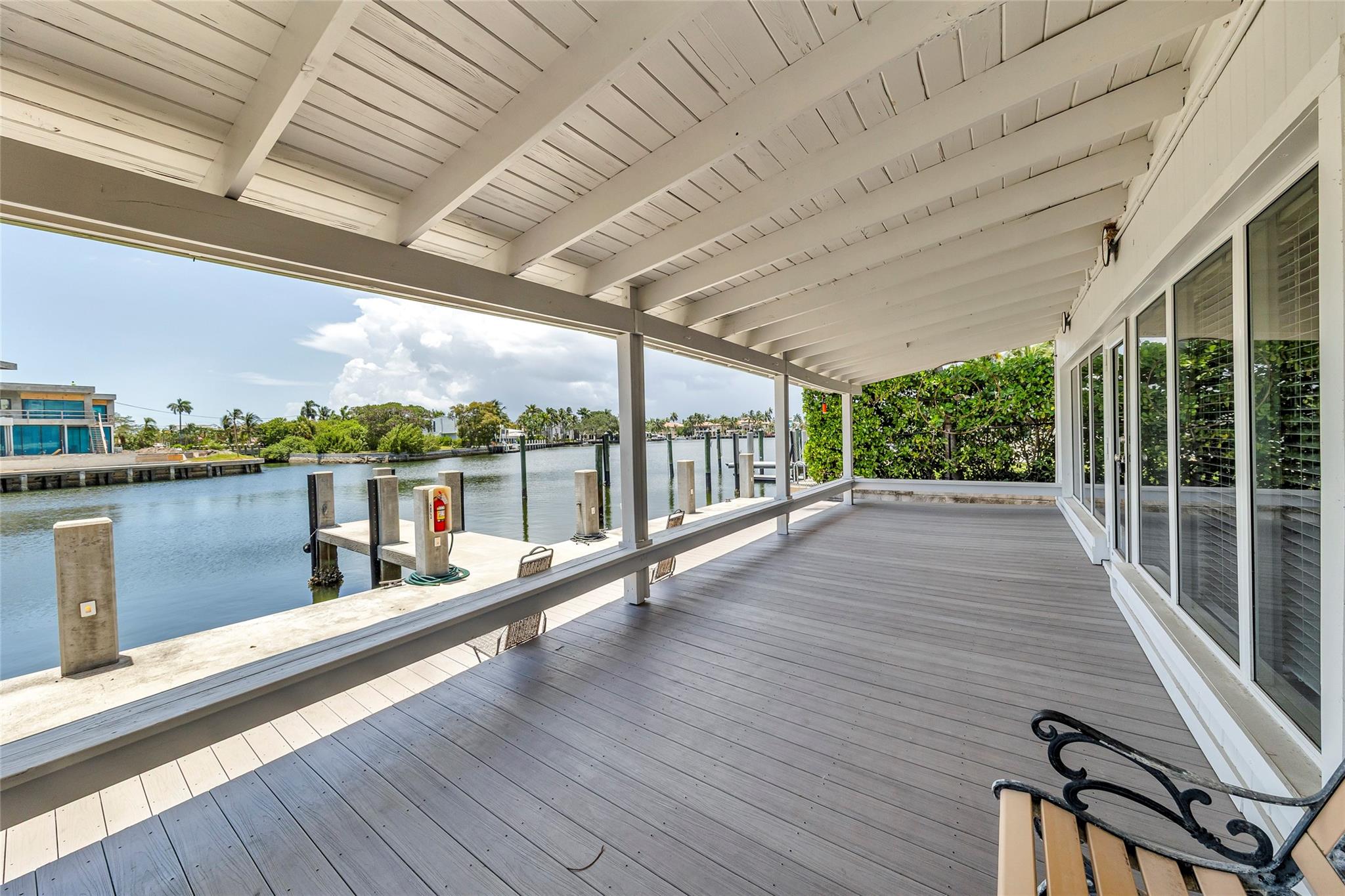 Tranquil waterfront living awaits in Riviera Isles, one of Fort Lauderdale’s most desirable neighborhoods just off Las Olas Boulevard and a short walk to the beach. This beautifully updated two-story home exudes Key West-style charm with a modern open-concept floor plan. The layout includes an oversized primary suite with breathtaking views of Sunset Lake. Recent upgrades include a brand-new kitchen, impact windows, new roof, and a reinforced seawall. One assigned parking space is included. No pets are allowed. A boat dock is available for lease, accommodating vessels up to 50 feet with a 39-foot beam. There are no fixed bridges to the ocean, but liveaboards are not permitted. This is a rare opportunity to enjoy serene, waterfront living in a prime location.