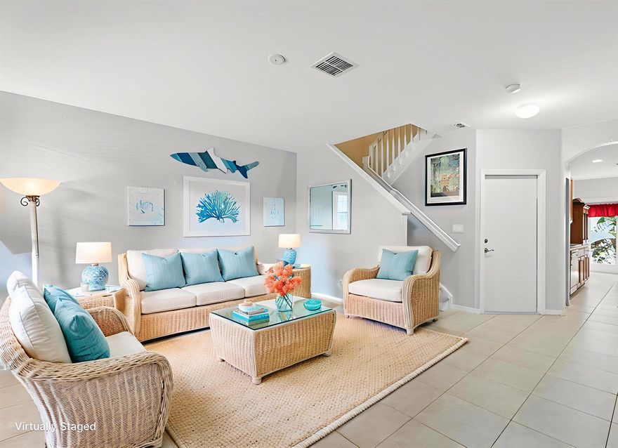 PRICED TO SELL! Move into this 3 bed, 2.5 bath townhouse located in the quiet community of East Lake Village. Perfectly situated for the ultimate Florida lifestyle, just a short distance from the beach, shopping, and the vibrant restaurants and nightlife of downtown Jensen Beach. This unit offers 3 generously sized bedrooms, with the owner's suite and one of the guest rooms having walk-in closets. Interior laundry is upstairs for convenience. Enjoy the low maintenance of attractive tile downstairs and vinyl flooring upstairs. Have peace of mind knowing major components are updated: a brand new 2025 roof, 2019 A/C, and a 2015 water heater, plus full hurricane protection. This clean, turn-key property offers low-maintenance living in a prime location.