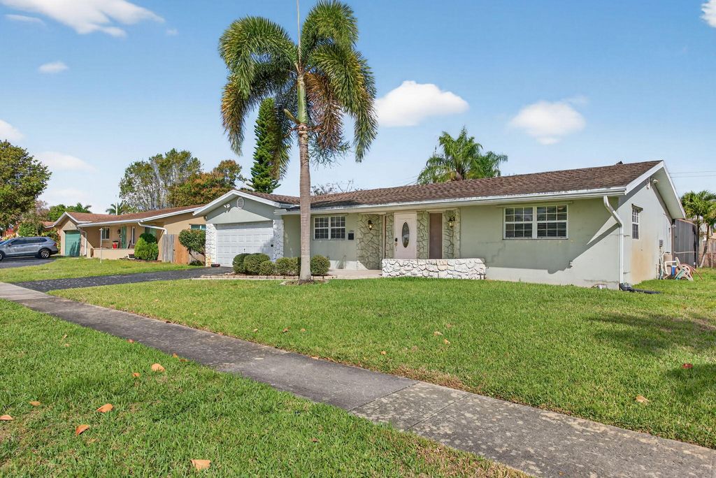 Photo of 4451 NW 7th Street, Coconut Creek, FL 33066 (MLS # B26002880)