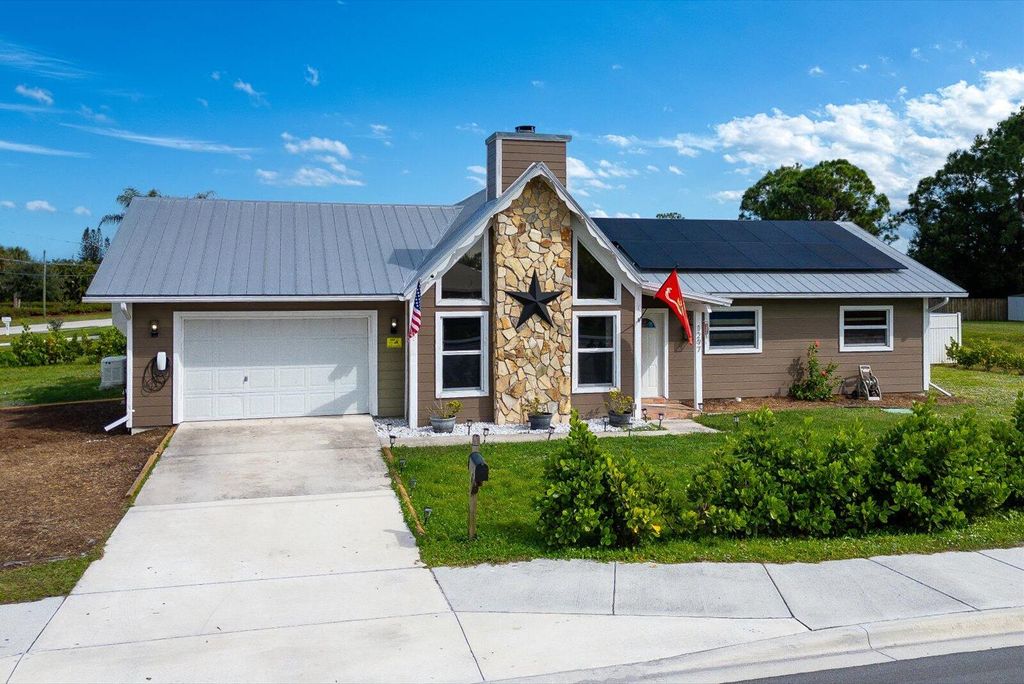 Photo of 1297 SE Floresta Drive, Port Saint Lucie, FL 34983 (MLS # B26025062)