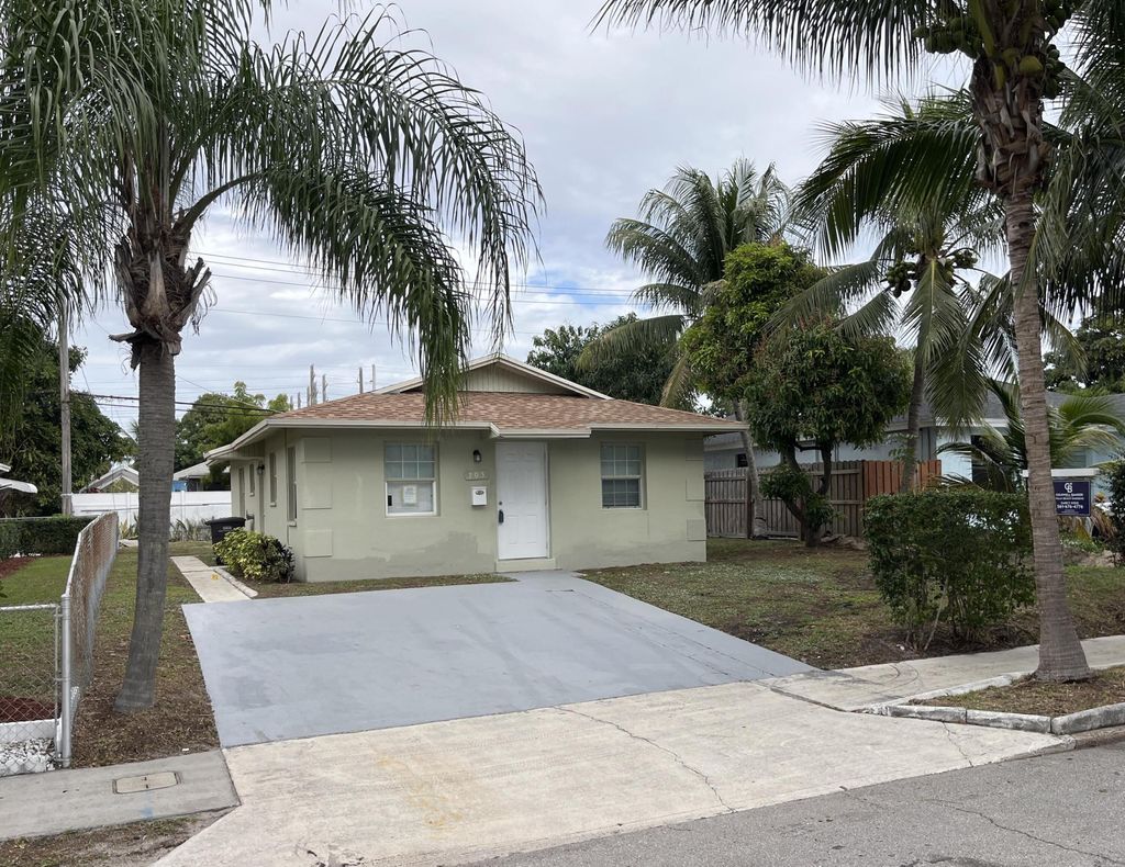Photo of 705 58th Street, West Palm Beach, FL 33407 (MLS # B26014075)