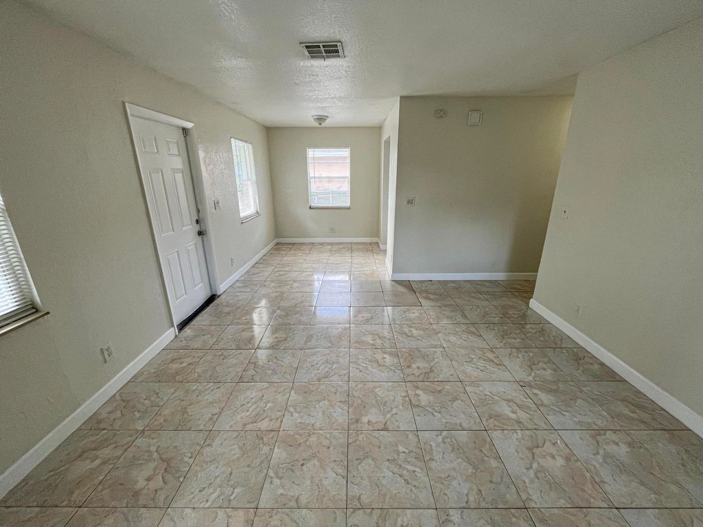 Photo of 705 58th Street, West Palm Beach, FL 33407 (MLS # B26014075)
