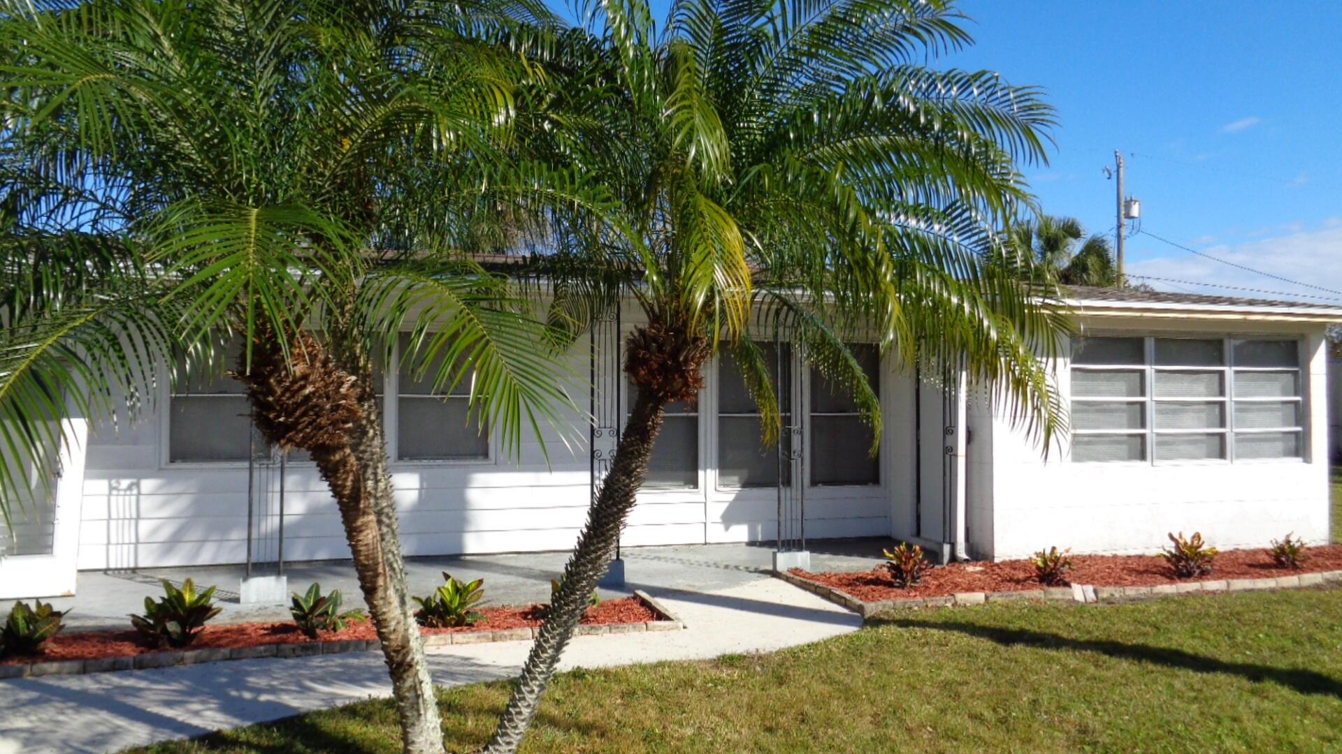 Unfurnished annual rental. Home is currently occupied, will be available for new residents mid August. This Charming 2 bedroom, 2 bath home with large back yard. Tile in all the rooms, living dining combo, Florida Room, covered front and back porches, patio for BBQ. Laundry closet with stackable washer and dryer. Breakfast nook in the kitchen. Home located in desirable Rock Ridge. Convenient central location in heart of Vero, near shopping, restaurants, medical, banks, parks, beaches, theater. Monthly lawn service included in monthly rent. Pets permitted, only prior owners approval is required for pets. Call to set appointment time for previewing this home inside. Reserve it for your move in date.