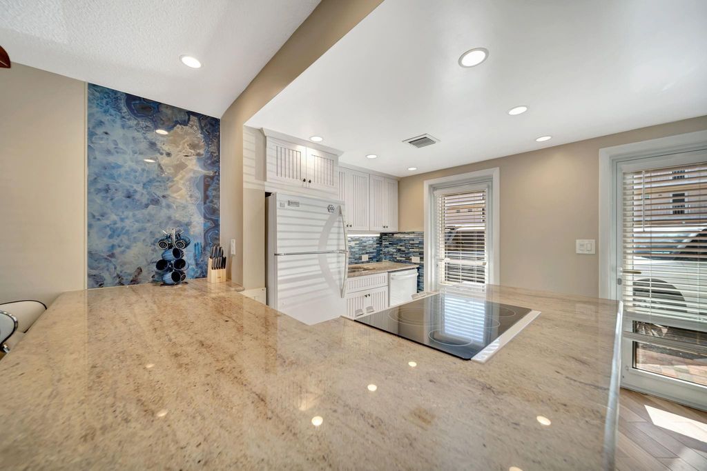 Photo of 1461 S Ocean Boulevard #110, Pompano Beach, FL 33062 (MLS # F10546791)