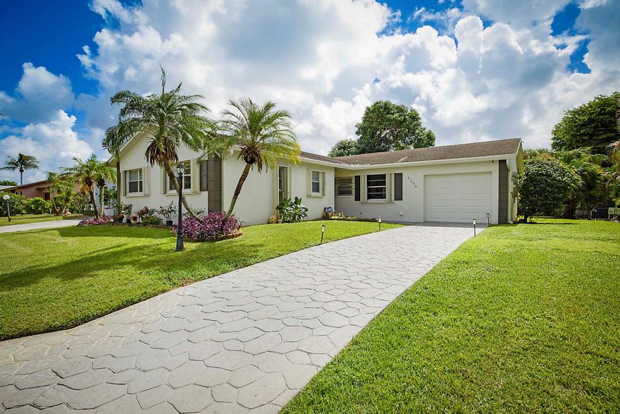 Don't miss the opportunity to own this 2/2 single family home in the highly desirable Lucerne Homes East 55+ Community. This home features a galley   Kitchen, beautifully updated bathroom and fresh paint throughout.  The Large Family Room  is perfect for entertaining.  Master bedroom features a walk-in closet and an en-suite bathroom with walk in shower. Large screened enclosed patio  overlooks a serene back yard perfect for gardening or relaxing with a good book.  Low HOA.  $158 a month includes Basic Cable, internet, Clubhouse with access to tennis courts, shuffleboard and a small gym, Community events and activities. Conveniently located near shopping, dining and parks.