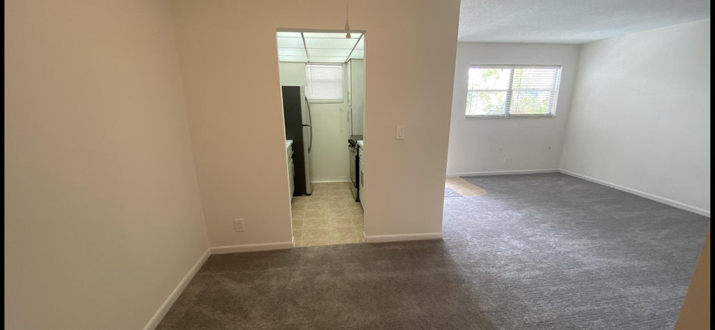 Photo of 3160 HOLIDAY SPRINGS Boulevard #7-311, Margate, FL 33063 (MLS # B26060824)