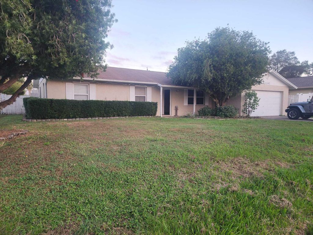 Photo of 1197 SW Heather Street, Port Saint Lucie, FL 34953 (MLS # R11146778)