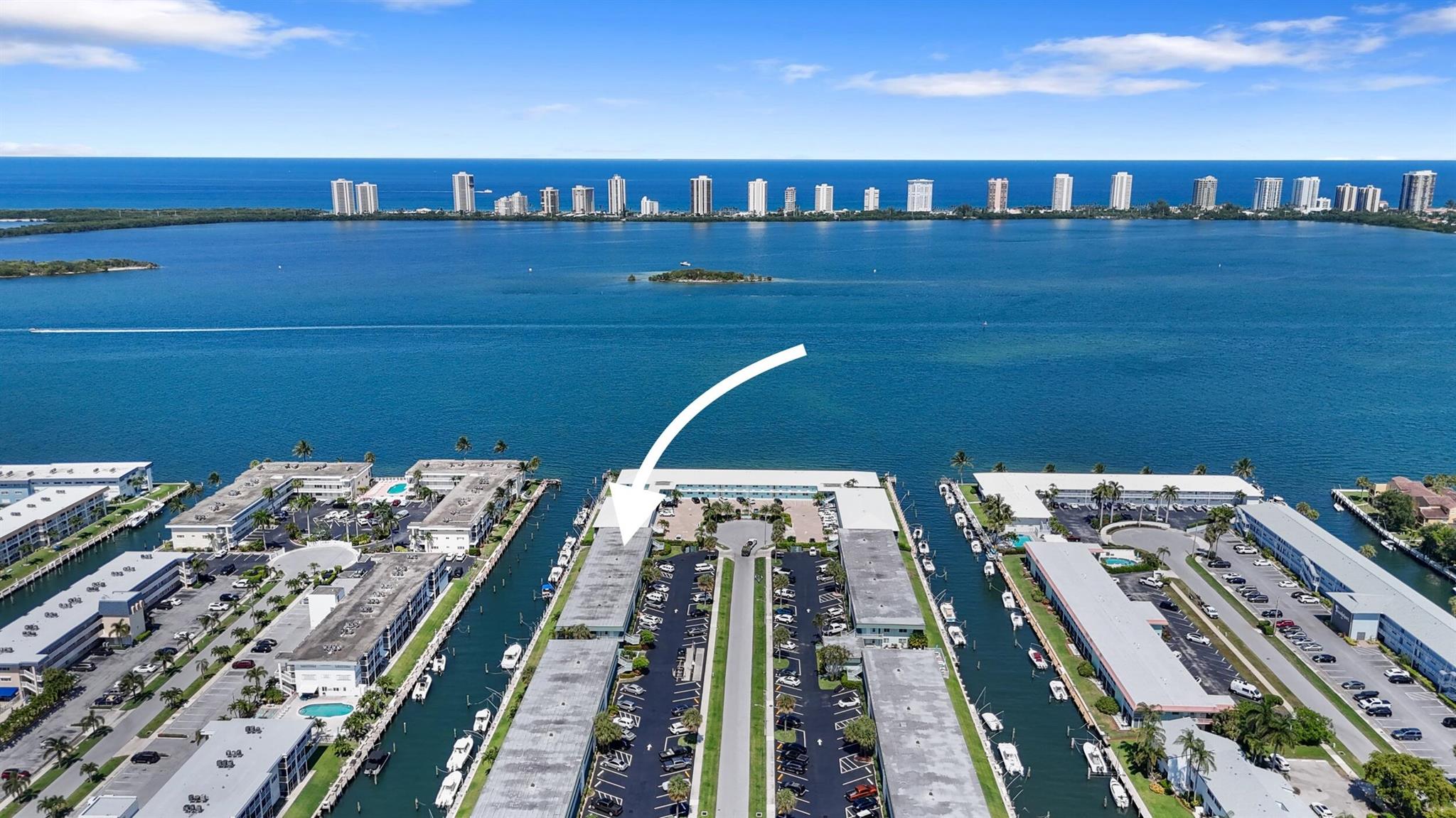 :Windor Park is situated along an interior canal just off the intracoastal in the Village of North Palm Beach. This fully renovated two-bedroom, two-bathroom condo features tile flooring throughout, along with soft close cabinetry in both the kitchen and bathrooms, which also include updated vanities. The master bedroom has a generous walk-in closet and has direct access to a screened patio that offers picturesque views of the canal and passing boats. The condo is equipped with impact windows adorned with plantation shutters, and the dining room, conveniently located adjacent to the kitchen, includes a bar with a wine cooler. This property is move-in ready and is ideally positioned near beaches, restaurants, and the North Palm Beach County Club.