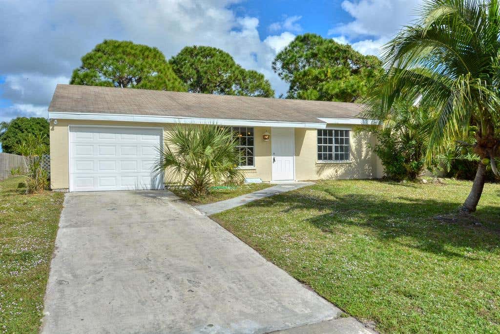 Photo of 382 SW Kentwood Road, Port Saint Lucie, FL 34953 (MLS # R10765169)