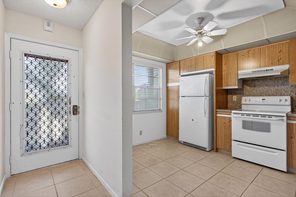 Photo of 2004 Granada Drive #C3, Coconut Creek, FL 33066 (MLS # F10540028)