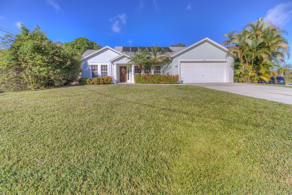 Photo of 2462 SW Valnera Street, Port Saint Lucie, FL 34953 (MLS # R10946980)