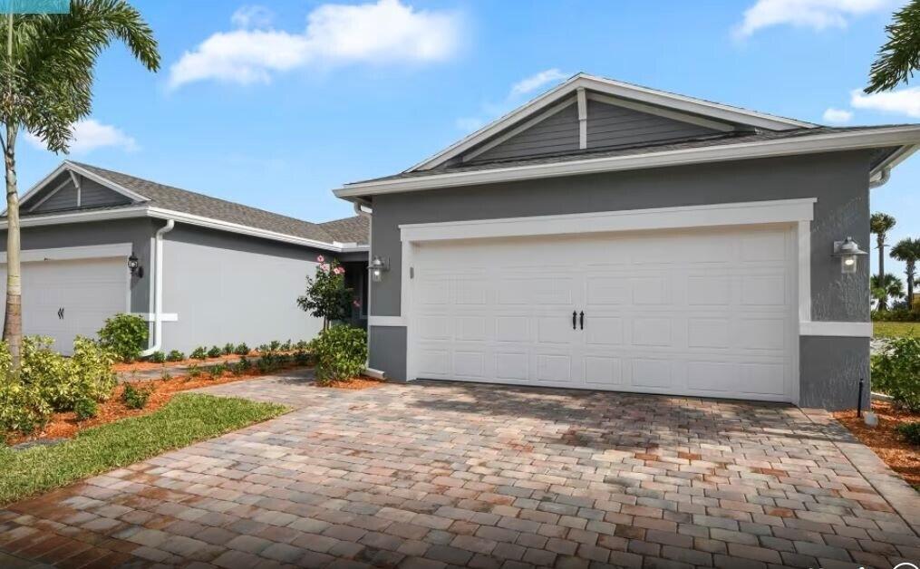 Photo of 12748 SW CATTLEYA Lane #Villa 204, Port Saint Lucie, FL 34987 (MLS # B26066441)