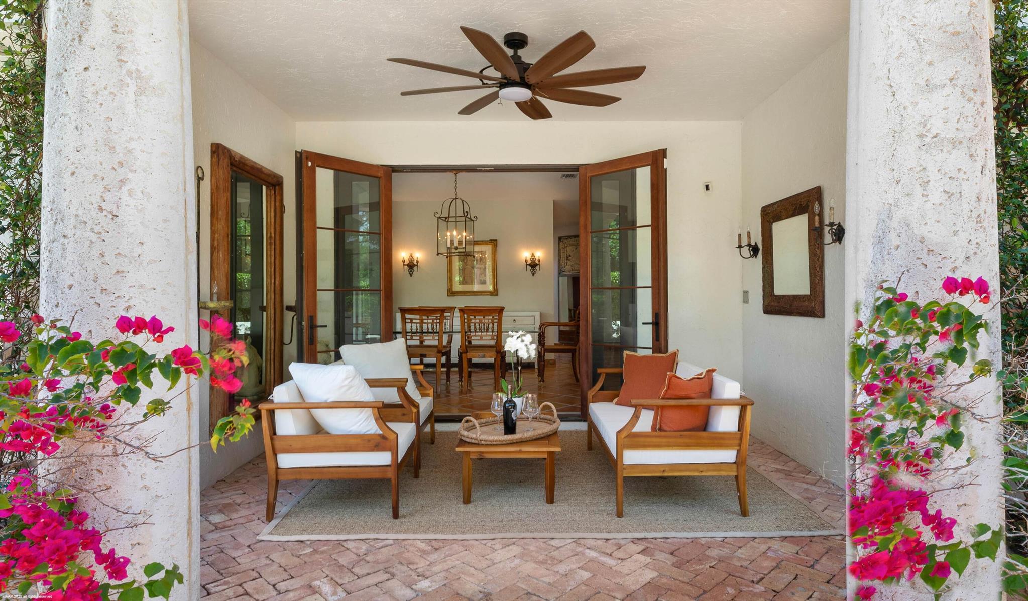 Discover the epitome of luxury living in this beautifully updated three-bedroom, 3.5-bath pool home, perfectly situated in the heart of Palm Beach Polo overlooking the picturesque Cypress golf course. This stunning residence boasts newer impact glass windows and an updated roof with gutters, ensuring both safety and style. The elegant primary bath provides a spa-like retreat, while the custom kitchen, equipped with top-of-the-line Miele appliances, is a chef's dream. This single-family home is a rare find, meticulously designed for comfort and sophistication, and is ready to welcome you for the upcoming season. Don't miss your chance to experience the ultimate in Florida living!