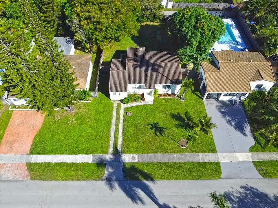 Welcome to paradise. East Hollywood home near South Lake, intercoastal, Hollywood Beach, downtown Hollywood and more. Three bedroom two bathroom split bedroom, plan with upgraded flooring, kitchen, and bathrooms. Walking distance to houses of worship. Plenty of shopping and grocery stores and banking all within walking distance less than half mile. This home has its own laundry room with room for storage. Huge backyard, perfect for entertaining or enjoying your beautiful space. Pet friendly but limited to one pet only, no aggressive breeds, and all pets must have their updated shots with evidence per city of hollywood ordinance.