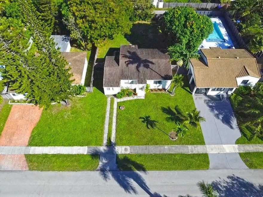 Welcome to paradise. East Hollywood home near South Lake, intercoastal, Hollywood Beach, downtown Hollywood and more. Three bedroom two bathroom split bedroom, plan with upgraded flooring, kitchen, and bathrooms. Walking distance to houses of worship. Plenty of shopping and grocery stores and banking all within walking distance less than half mile. This home has its own laundry room with room for storage. Huge backyard, perfect for entertaining or enjoying your beautiful space. Pet friendly but limited to one pet only, no aggressive breeds, and all pets must have their updated shots with evidence per city of hollywood ordinance.