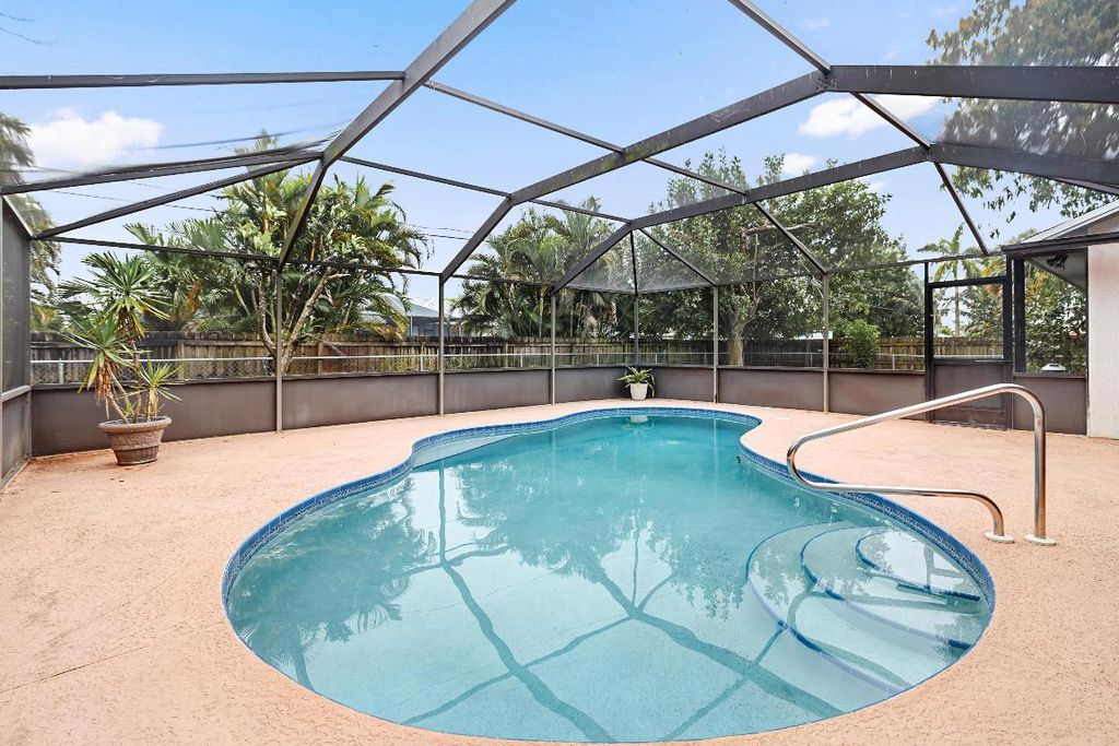 Photo of 2361 SW Woodridge Street, Port Saint Lucie, FL 34953 (MLS # R10960917)