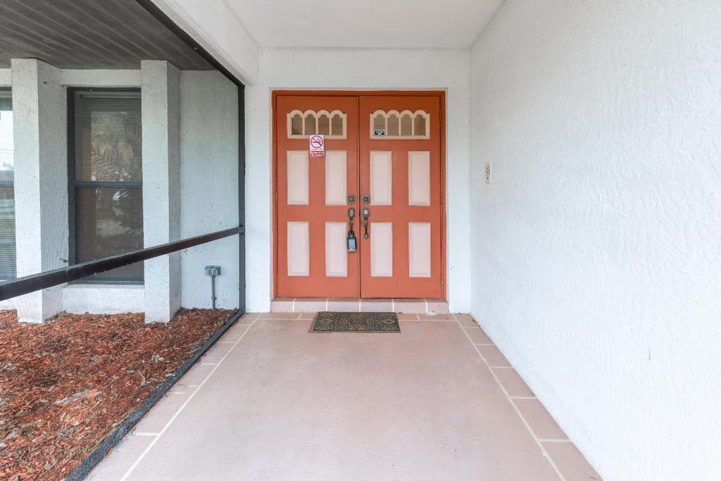 Photo of 2361 SW Woodridge Street, Port Saint Lucie, FL 34953 (MLS # R10960917)
