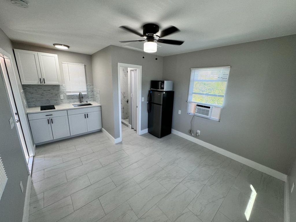 Photo of 2843 Forest Hill Boulevard #1, Palm Springs, FL 33406 (MLS # R10961808)