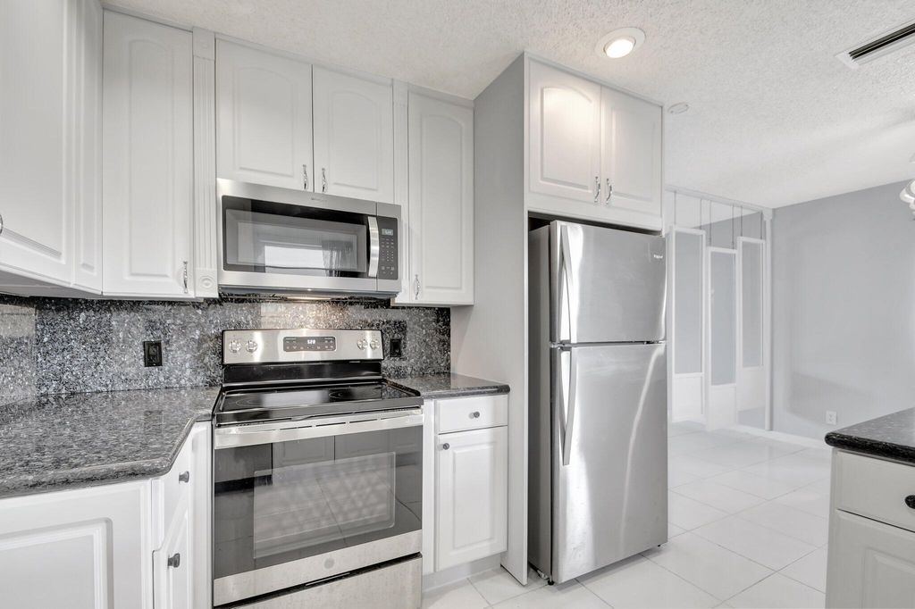 Photo of 2212 Park Street, Lake Worth Beach, FL 33460 (MLS # R10992588)