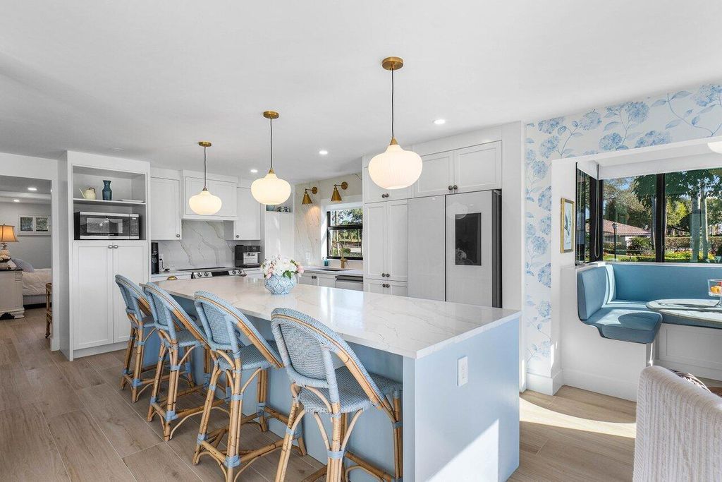 Photo of 10111 Quail Covey Road #Hibiscus N, Boynton Beach, FL 33436 (MLS # R11124460)