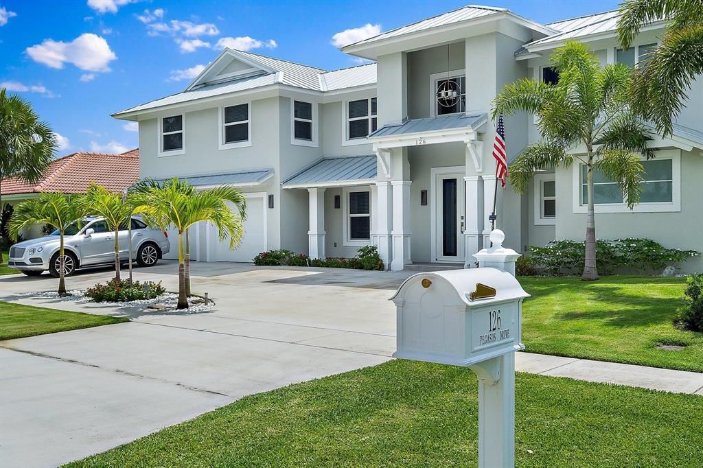 Photo of 126 Pegasus Drive, Jupiter, FL 33477 (MLS # R10730192)