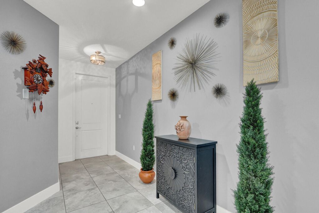 Photo of 3010 King Palm Way, Riviera Beach, FL 33410 (MLS # B26013144)