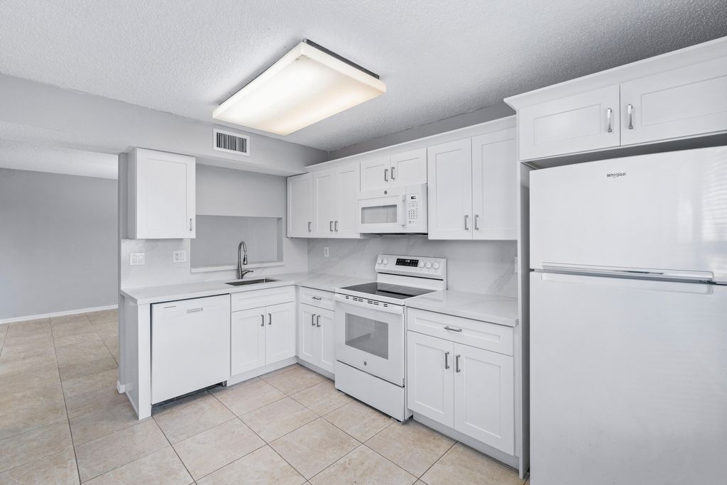 Photo of 10930 Lakemore Lane #103, Boca Raton, FL 33498 (MLS # R11052684)