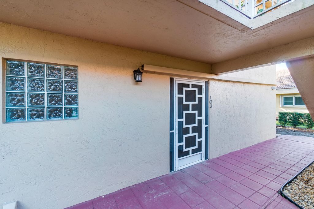 Photo of 10930 Lakemore Lane #103, Boca Raton, FL 33498 (MLS # R11052684)