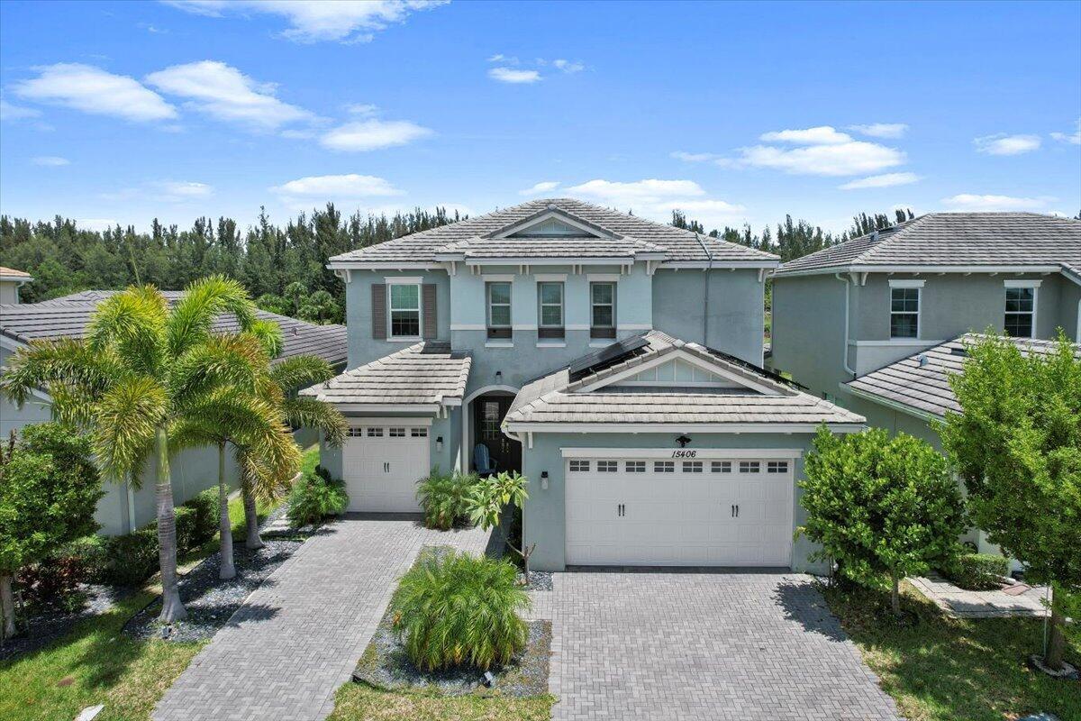 Welcome to The Meadows, a gated neighborhood nestled in the heart of the vibrant and growing Westlake community.This beautifully designed 3-bedroom, 2.5-bath home offers an open-concept layout with sleek tile flooring throughout, creating a bright and modern living space. The expansive, pet-friendly backyard is ideal for entertaining, playtime, or simply relaxing under the Florida sun.Upstairs, enjoy peaceful lake and green space views from the comfort of your bedrooms. Plus, the 3-car garage offers ample room for vehicles and even golf cart storage--a must-have in this golf-cart-friendly town!
